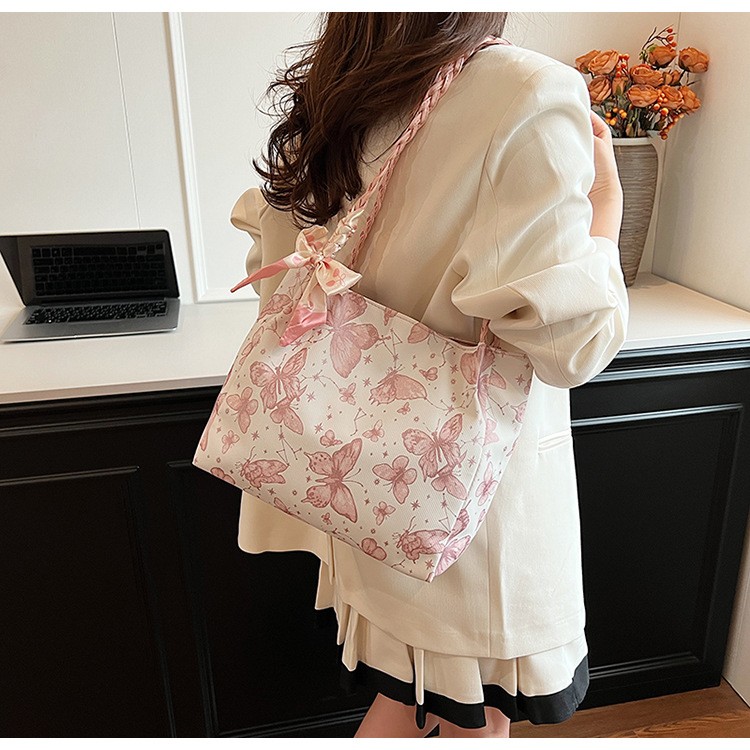 Elegant Pink Butterfly Tote Bag with Braided Handles and Bow Accent